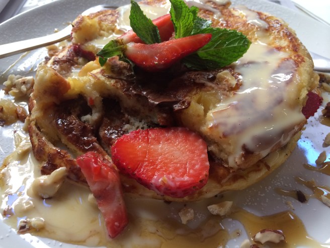 Nutella and banana pancakes - roasted hazlenuts, strawberries served with vanilla custard - The Meeting Place, South Yarra
