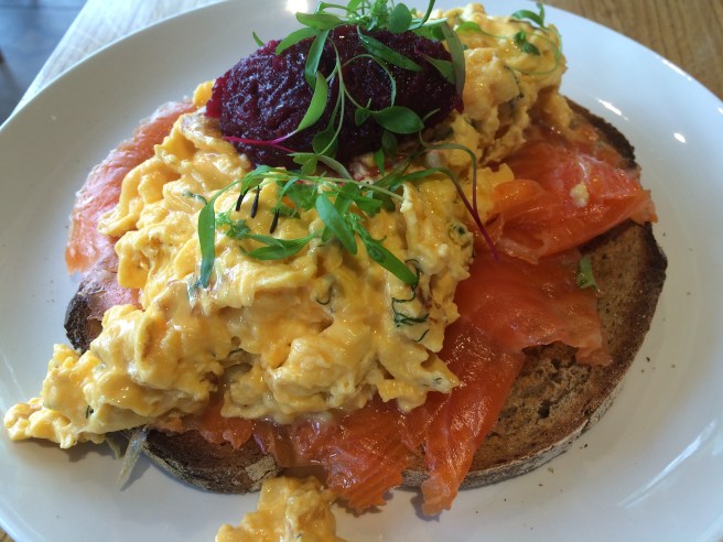 Gin and dill cured ocean trout with creamy goats cheese and dill scrambled eggs, beetroot relish on toasted rye - Urban Provedore, South Yarra